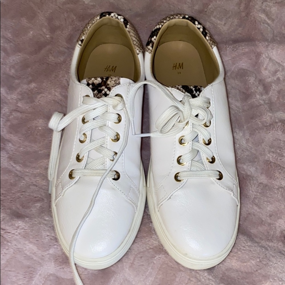 White shoes with snake skin design